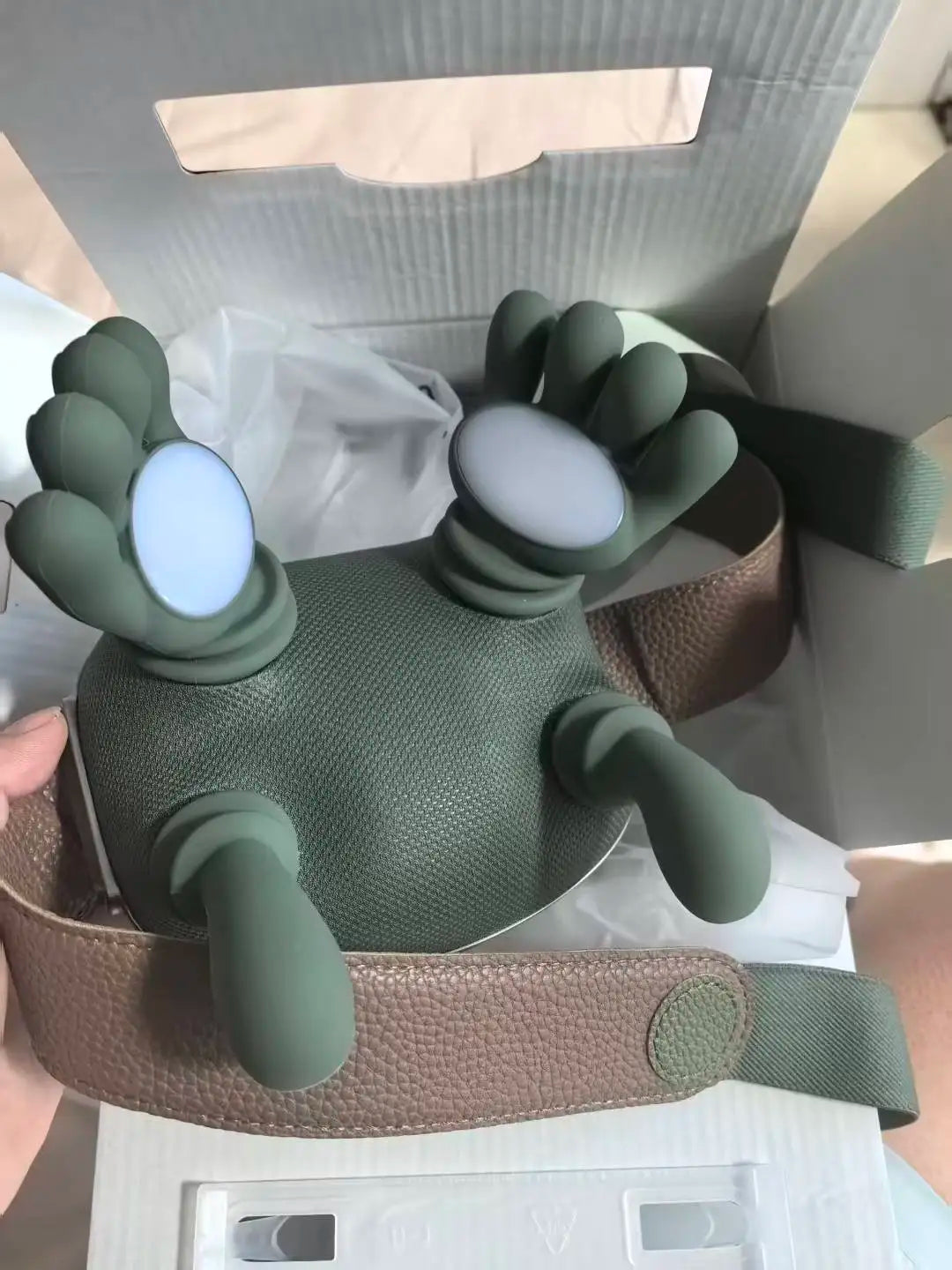 Underside of massager showing bionic finger massage nodes